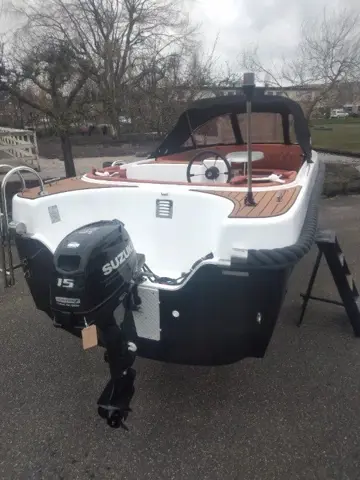 Te koop Excellent 5m met F 9,9 Suzuki injectie!