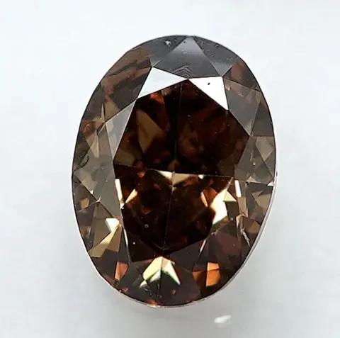 Diamant - 0.61 ct - Ovaal - Natural Fancy Brownish Yellow -