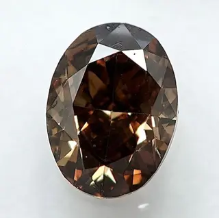 Diamant - 0.61 ct - Ovaal - Natural Fancy Brownish Yellow -