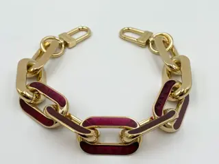 Louis Vuitton - accessorio catena dorata coussin -