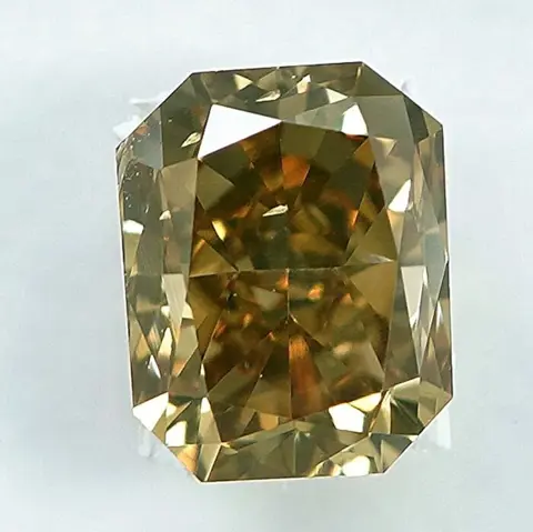 Diamant - 0.57 ct - Radiant - Natural Fancy Brownish Yellow