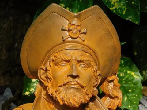 Tuinbeeld van een gedetaieerde man ,kado