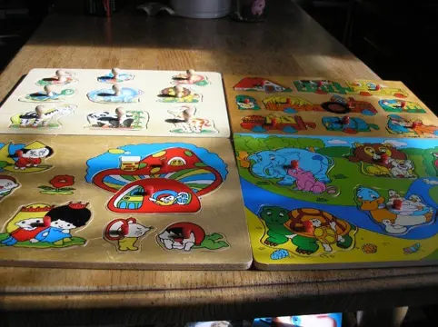 Kinderpuzzels, Houten puzzels met of zonder knopjes