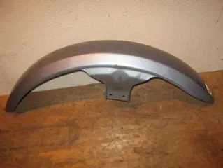 Used voorspatbord v65 grijs           /a