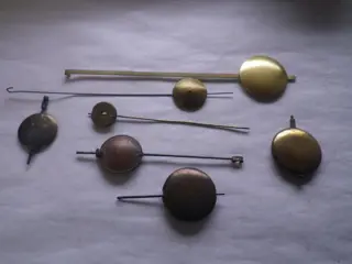 25 pendule slingers - Ijzer en messing - 20e eeuw