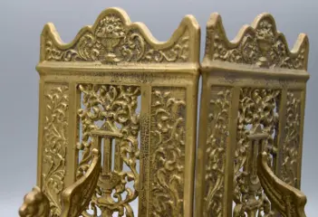 gevleugelde leeuw boekensteunen - Brons - Midden 20e eeuw