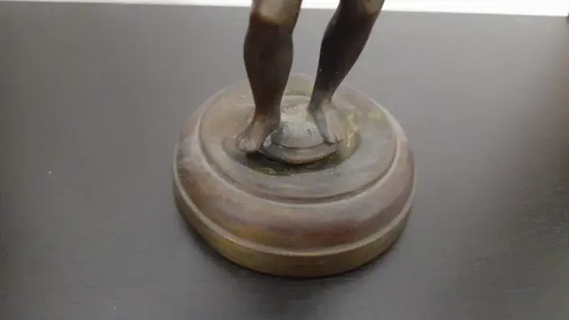 Oude putto met rammelaars - Brons - Eerste helft 20e eeuw