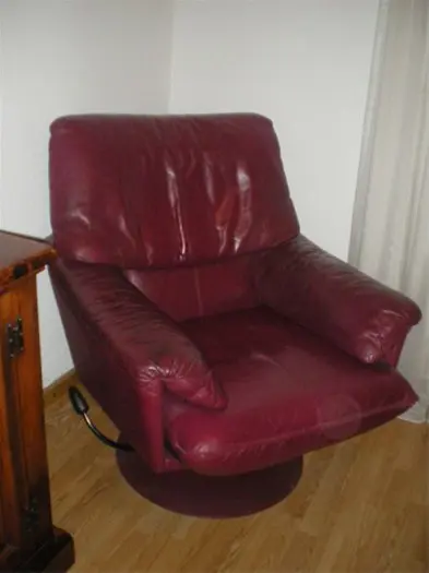 Leolux draaifauteuill. leer, donkerrood