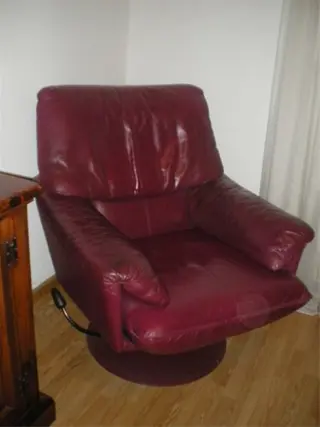 Leolux draaifauteuill. leer, donkerrood