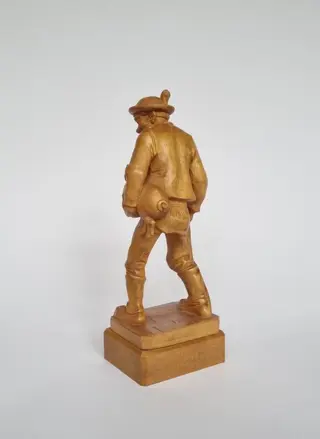 Farmer with piglet - Hout