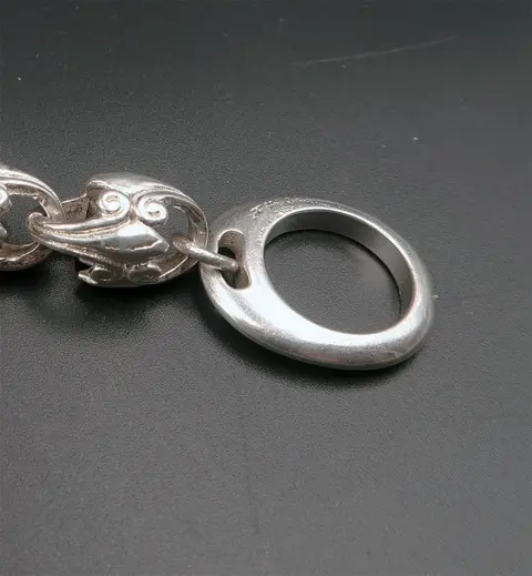 Sierlijke beschermende armband - Leliebloemkruis - Geloof, wijsheid en ridderlijkheid