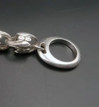 Sierlijke beschermende armband - Leliebloemkruis - Geloof, wijsheid en ridderlijkheid