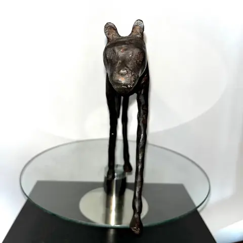 Issouf Derme - Brons voorstellende een jachtluipaard - lengte 38 cm - Brons