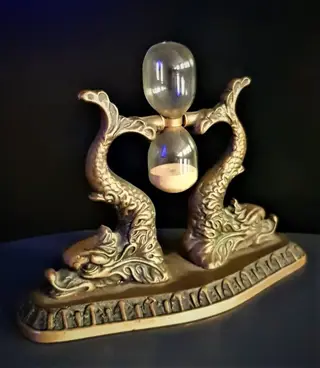 Max Le Verrier - Max le Verrier - Schitterend zandloperbeeld met twee denkbeeldige hoofden gesigneerd - Brons