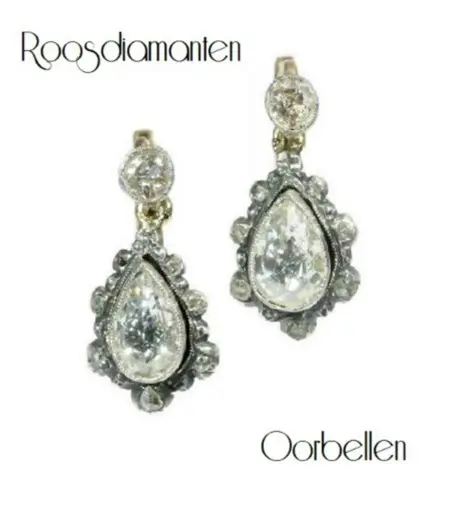 Gouden, diamanten, briljanten en roosdiamanten oorbellen.