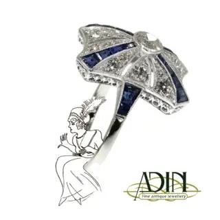 Vintage verlovingsring met blauw saffier en diamant