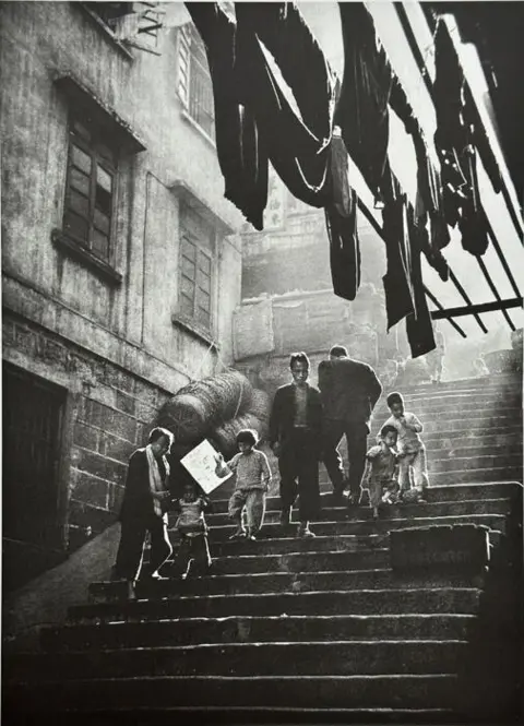 Fan Ho (1931-2016) - Street Scene, Hong Kong 1957