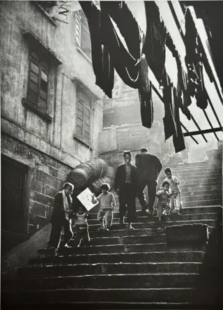 Fan Ho (1931-2016) - Street Scene, Hong Kong 1957