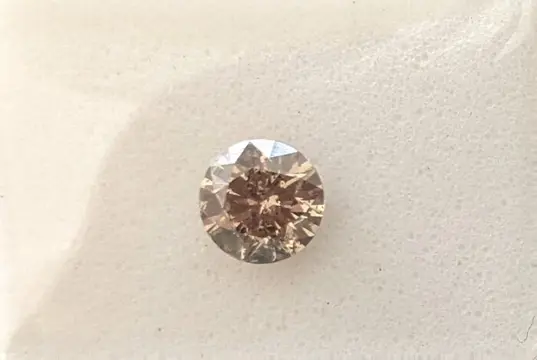 Diamant - 0.55 ct - Rond - fancy oranjeachtig bruin - P1