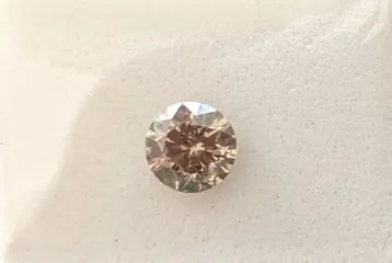 Diamant - 0.55 ct - Rond - fancy oranjeachtig bruin - P1
