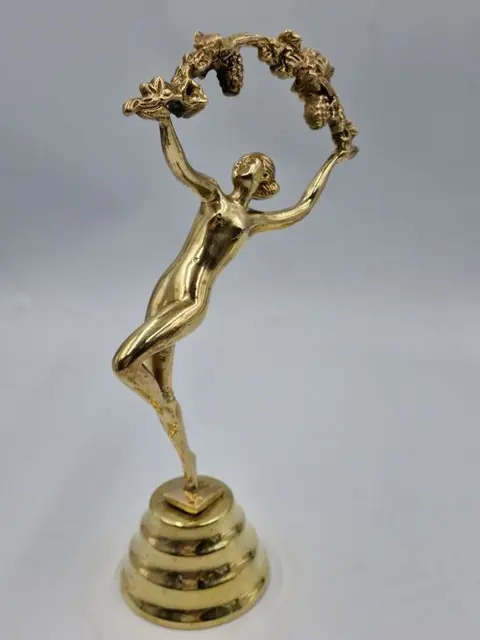 Dancing woman on a pedestal