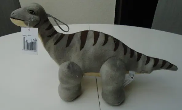 KNUFFEL DINO GRIJS NIEUW.
