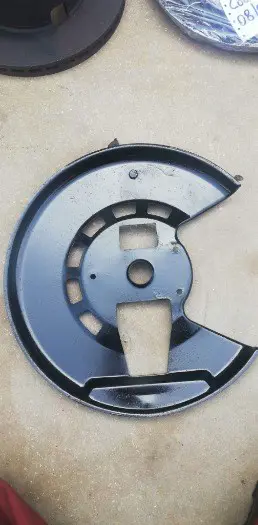 Front brake disc protection shields