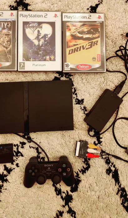 1 Sony PlayStation 2 - Console met Games (4) - Zonder originele verpakking