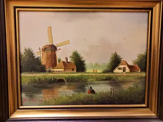 Johannes Eerdmans (1950) - Hollands landschap met molen en visser