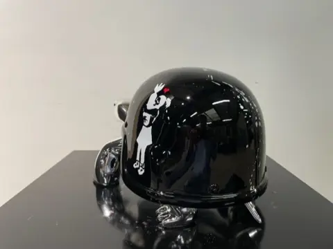 Van Apple - The Silver Peace Turtle - Banksy Bomb Hugger