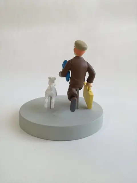 Tintin - Statuette Moulinsart / Yamato - L’oreille cassée / Valise jaune - (2008)