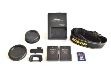 Nikon D5100 + Nikon AF-S DX Nikkor 18-55mm f/3.5-5.6G EDVR + Battery Grip + Lowepro Bag# EXCELLENT #