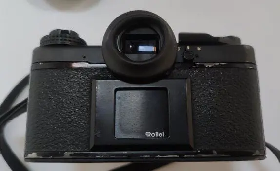 Rollei Rolleiflex SL 35 E + HFT 50mm 1.8 Planar + HFT 135mm 4 télé Tessar