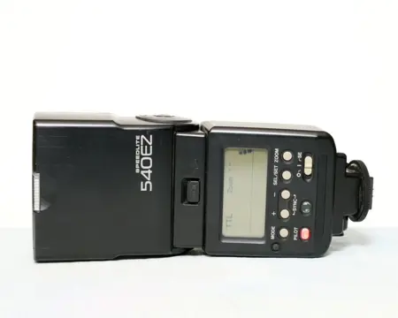 Canon Speedlite 540EZ met powerpack.