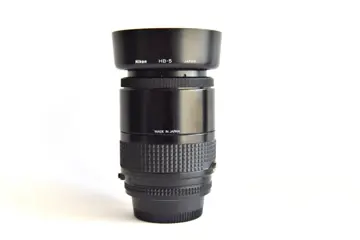 Nikon AF Nikkor 35-105mm f3.5-4.5 Macro (rotary zoom lens) + Nikon HB-5 lens hood # Excellent #
