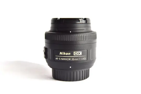 Nikon AF-S DX Nikkor 35mm f1.8G ED IF SWM+ Nikon HB-46 lens hood + Hoya HMC UV filter # EXCELLENT #