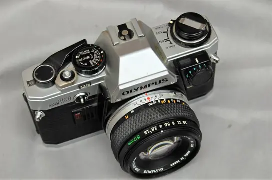 Olympus OM 10 met manual adapter + Zuiko 1,8/50mm