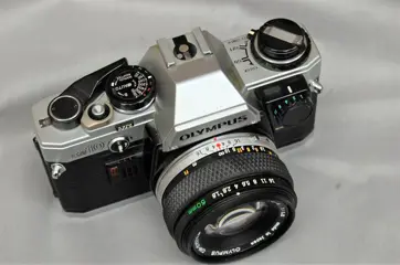 Olympus OM 10 met manual adapter + Zuiko 1,8/50mm