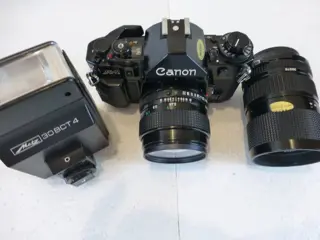 Canon A-1 Black + FD 1,4/50mm + Zoom FD 4/35-70mm + Metz flash