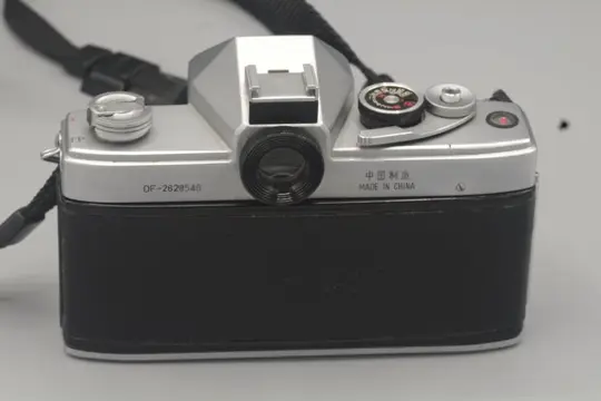 Seagull DF + Haiou-64 lens 58mm f2.0 in origianal leather case and Seconic light meter.