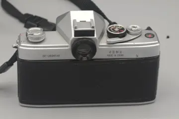 Seagull DF + Haiou-64 lens 58mm f2.0 in origianal leather case and Seconic light meter.