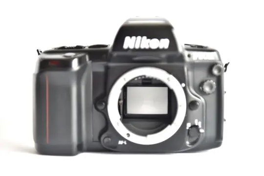 Nikon AF F90x + Nikon camera strap + 4 Varta batteries, new