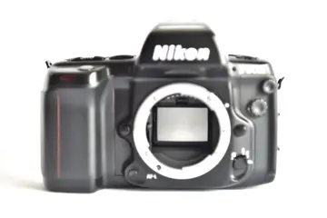 Nikon AF F90x + Nikon camera strap + 4 Varta batteries, new