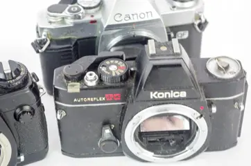 Canon, Konica, Minolta Lot of 4 SLR Cameras NOT TESTED