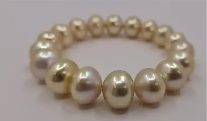 10.5x13mmSouth Sea Pearls Champagne Goud - Armband