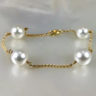 Australian Southsea RD Ø 10x11 mm - 18 karaat Geel goud - Armband Zuidzee parel