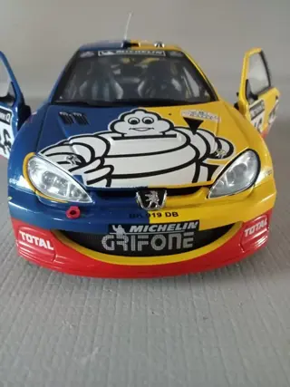 Sunstar, Solido - 1:18 - Peugeot 206 Rallye # 46 Valention Rossi / Peugeot 206 Rallye WRC