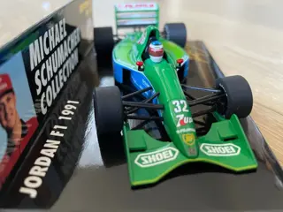 Minichamps - 1:43 - Jordan Ford 191 - Michael Schumacher - 1991 -#32 - Spa-Francorchamps - Eerste race