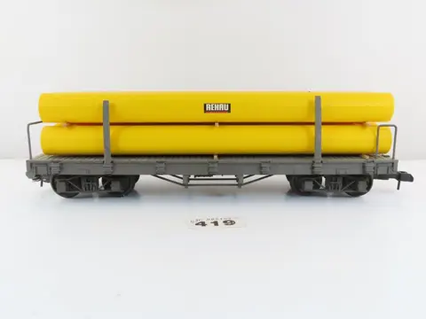 LGB, Zelfbouw G - Goederenwagon - 4-assige platte wagen met rongen en lading buizen met opdruk "Rehau"