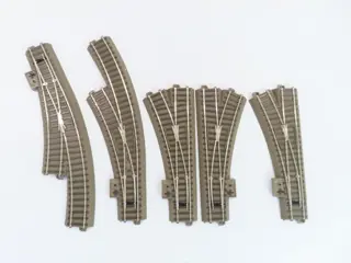 Trix H0 - 62900 - Rails - 31-delige uitbreidings-railset met o.a. (meegebogen) handwissel links/rechts, C-Rail